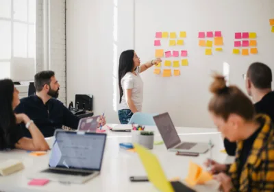 Professionals collaborating around a meeting table